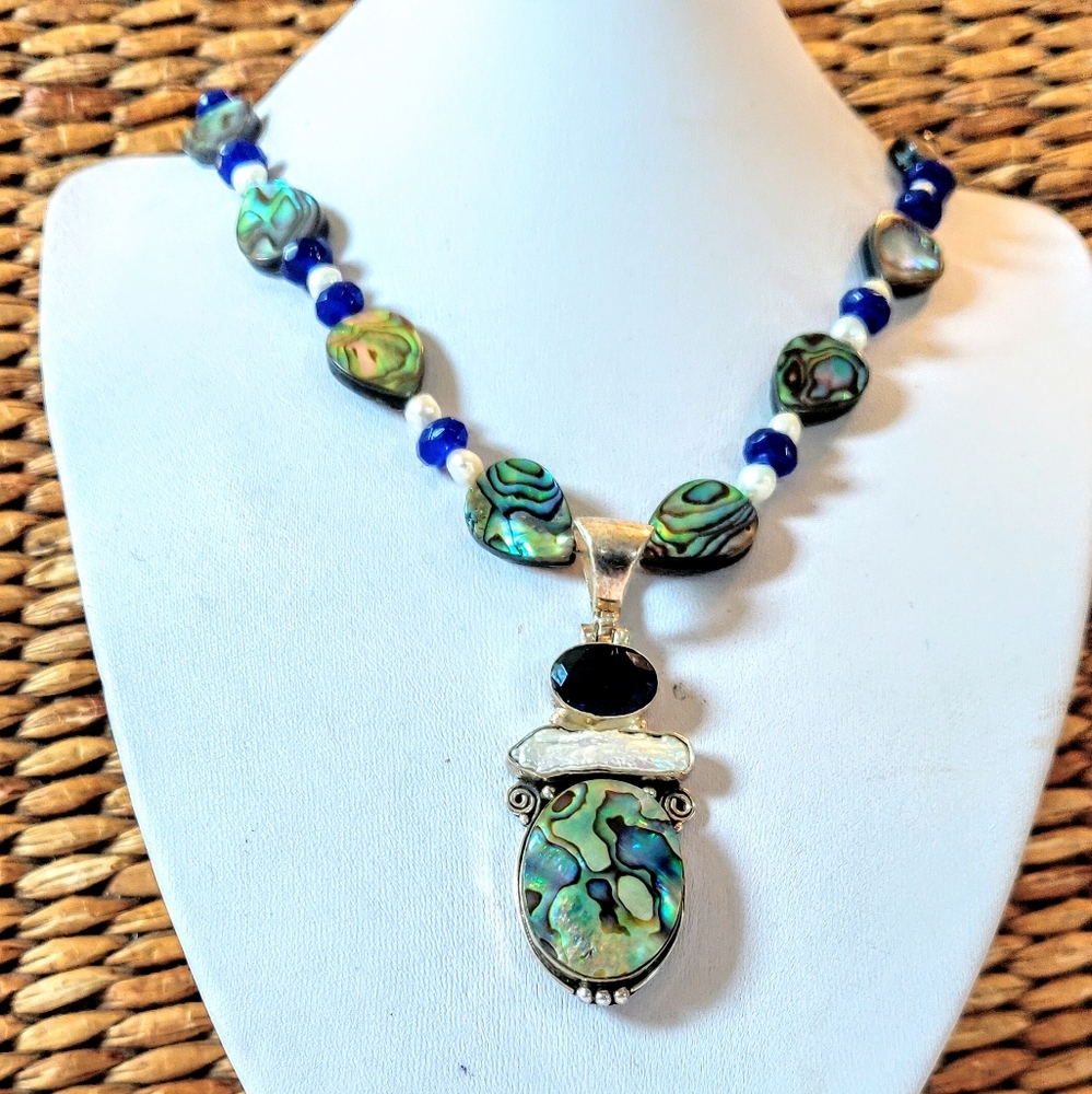 Abalone shell, blue sapphires and pearls